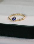 Slanted Blue Sapphire Twisted Ring