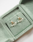 Four Pearl Earrings with Jackets